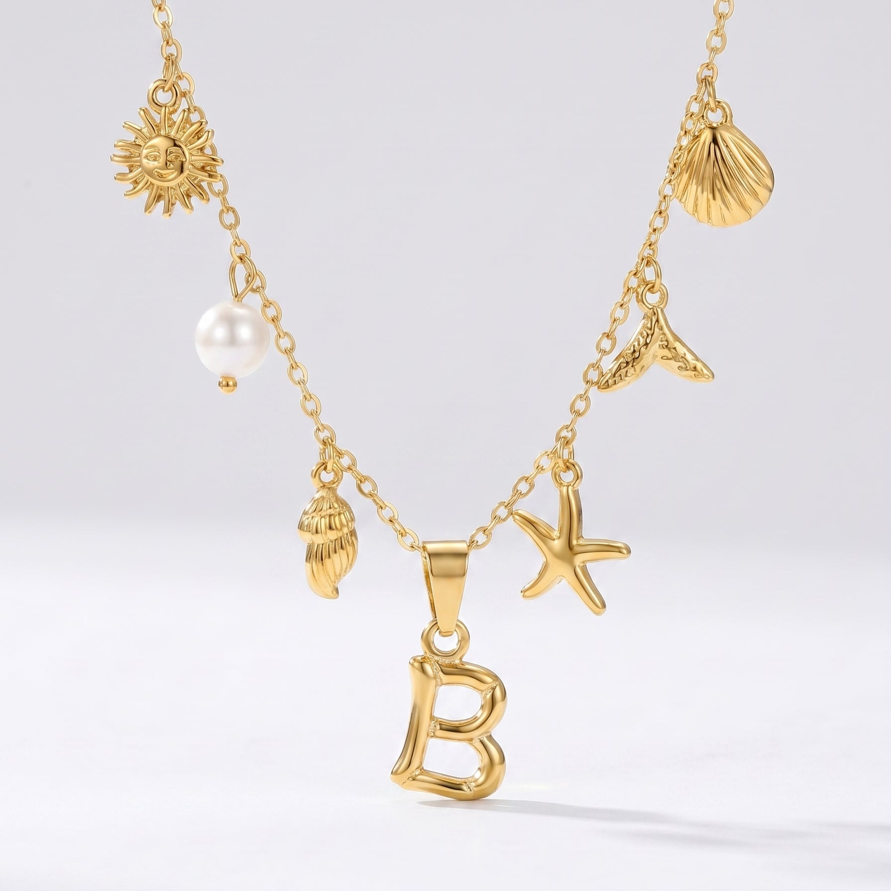 Colar Letra Oceano Dourado
