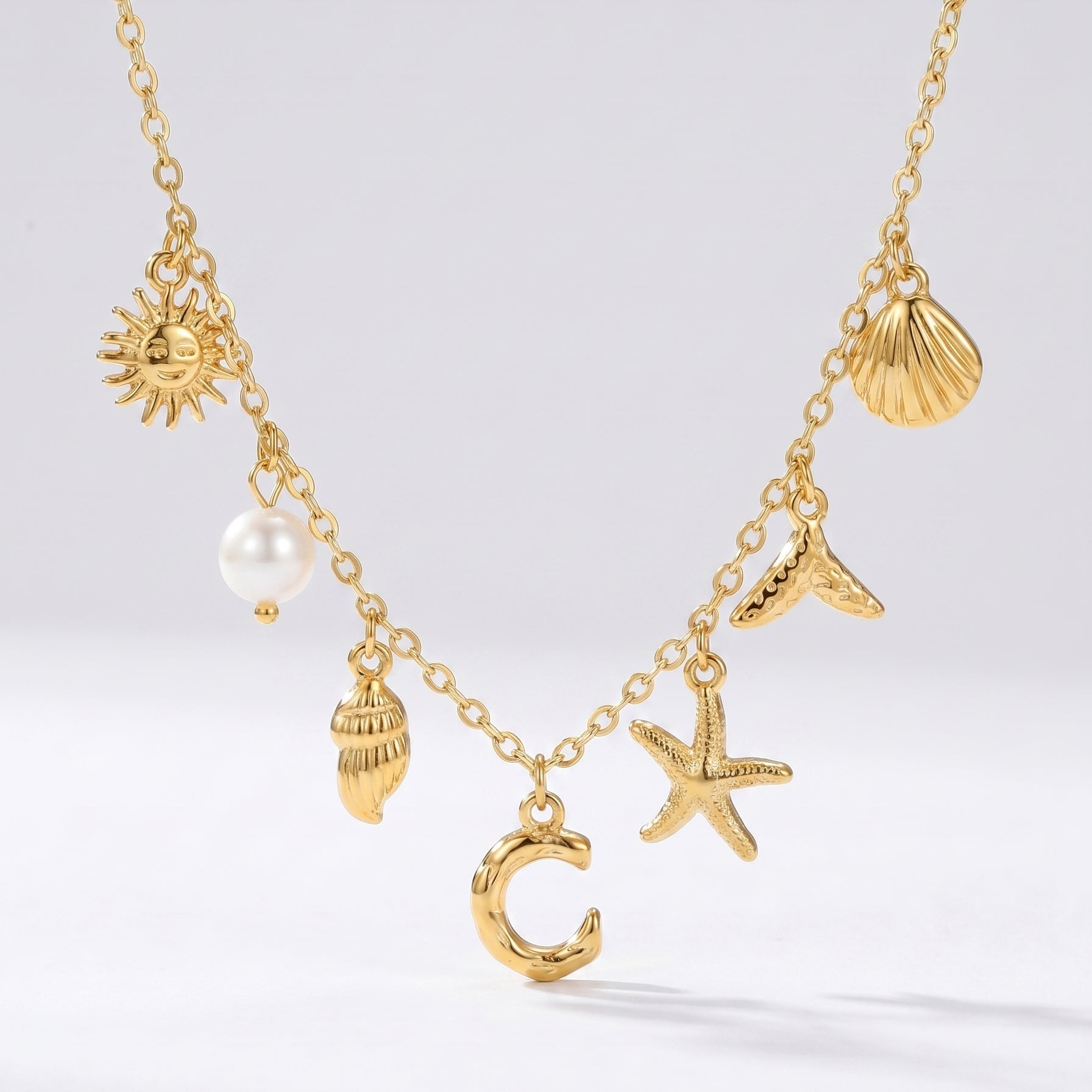Colar Letra Oceano Dourado