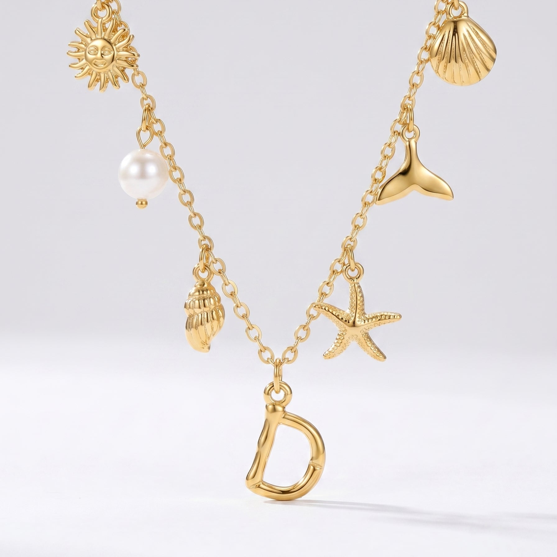 Colar Letra Oceano Dourado