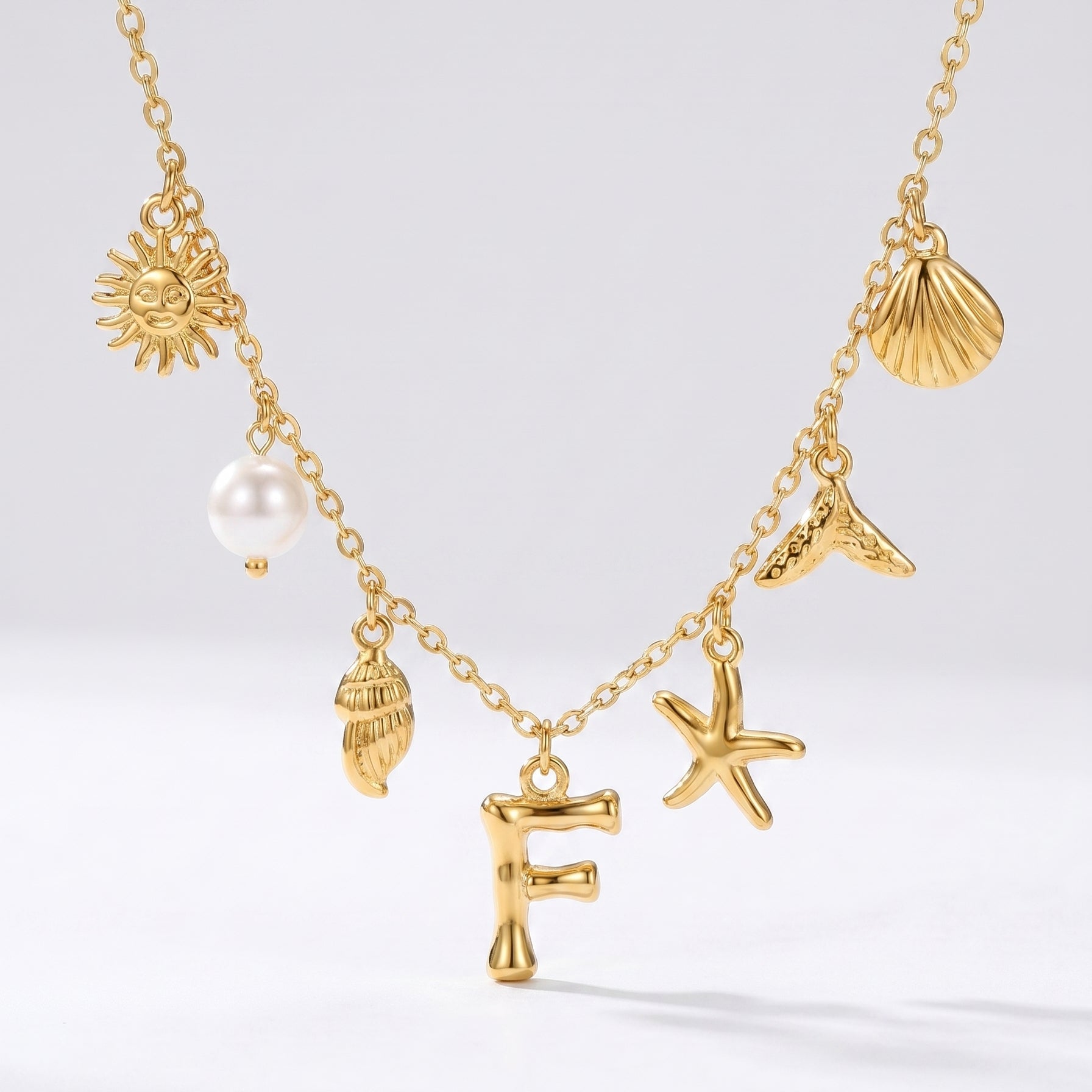 Colar Letra Oceano Dourado