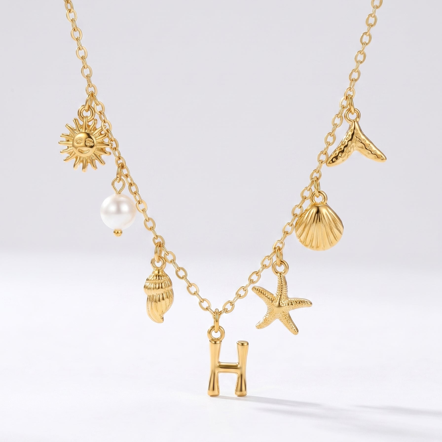 Colar Letra Oceano Dourado