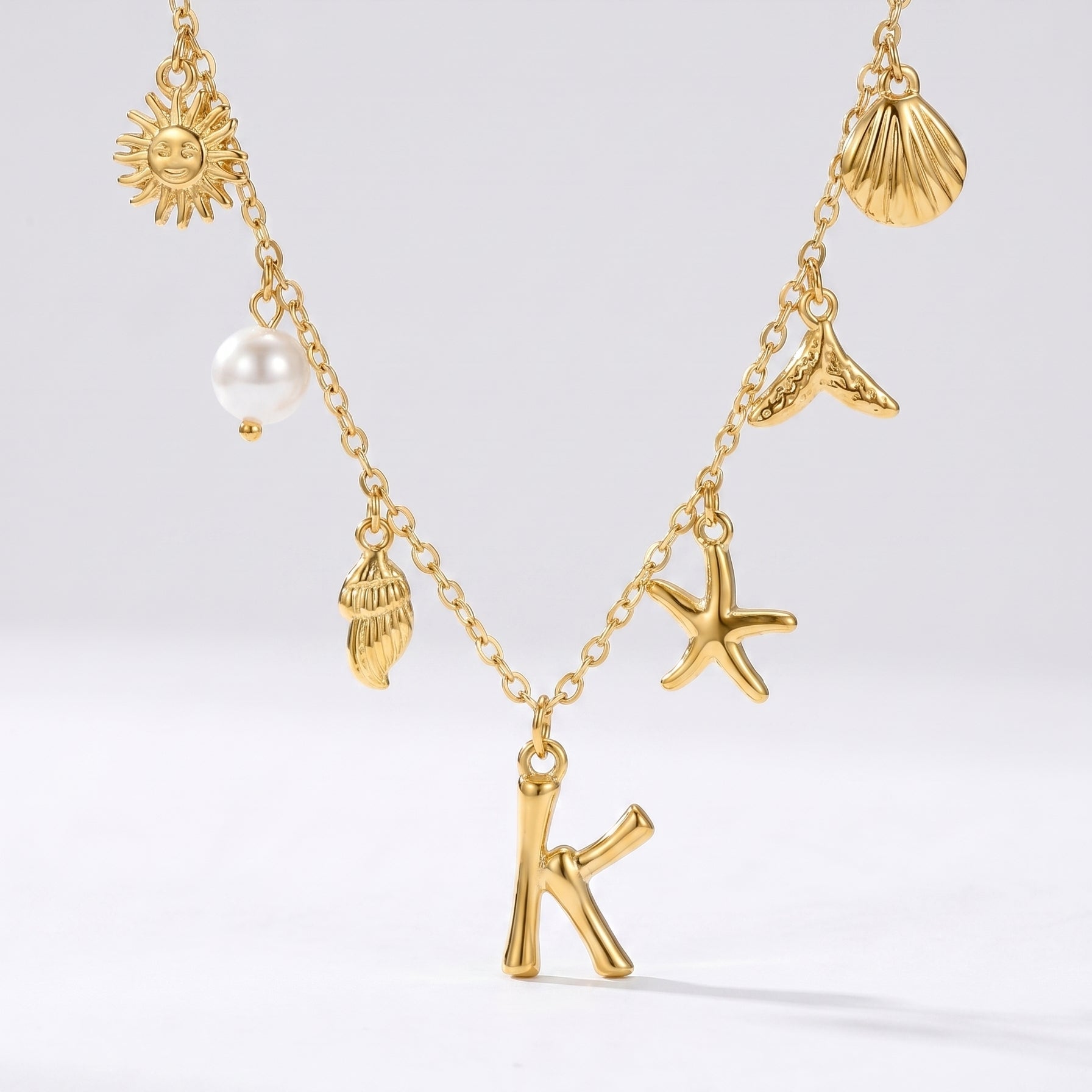 Colar Letra Oceano Dourado