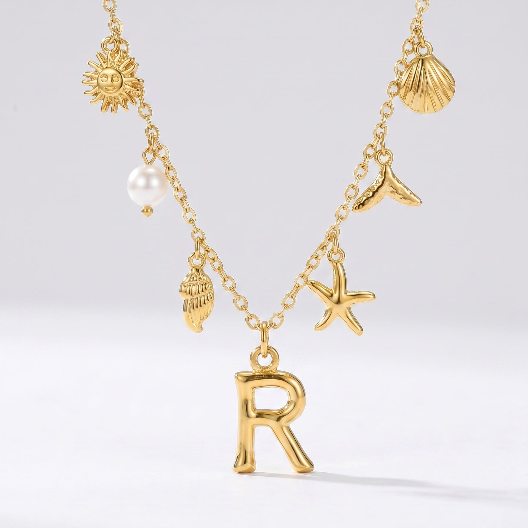 Colar Letra Oceano Dourado