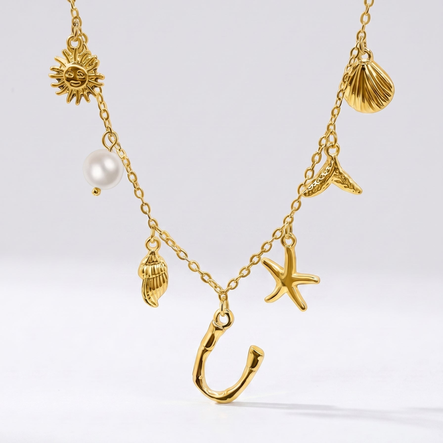 Colar Letra Oceano Dourado