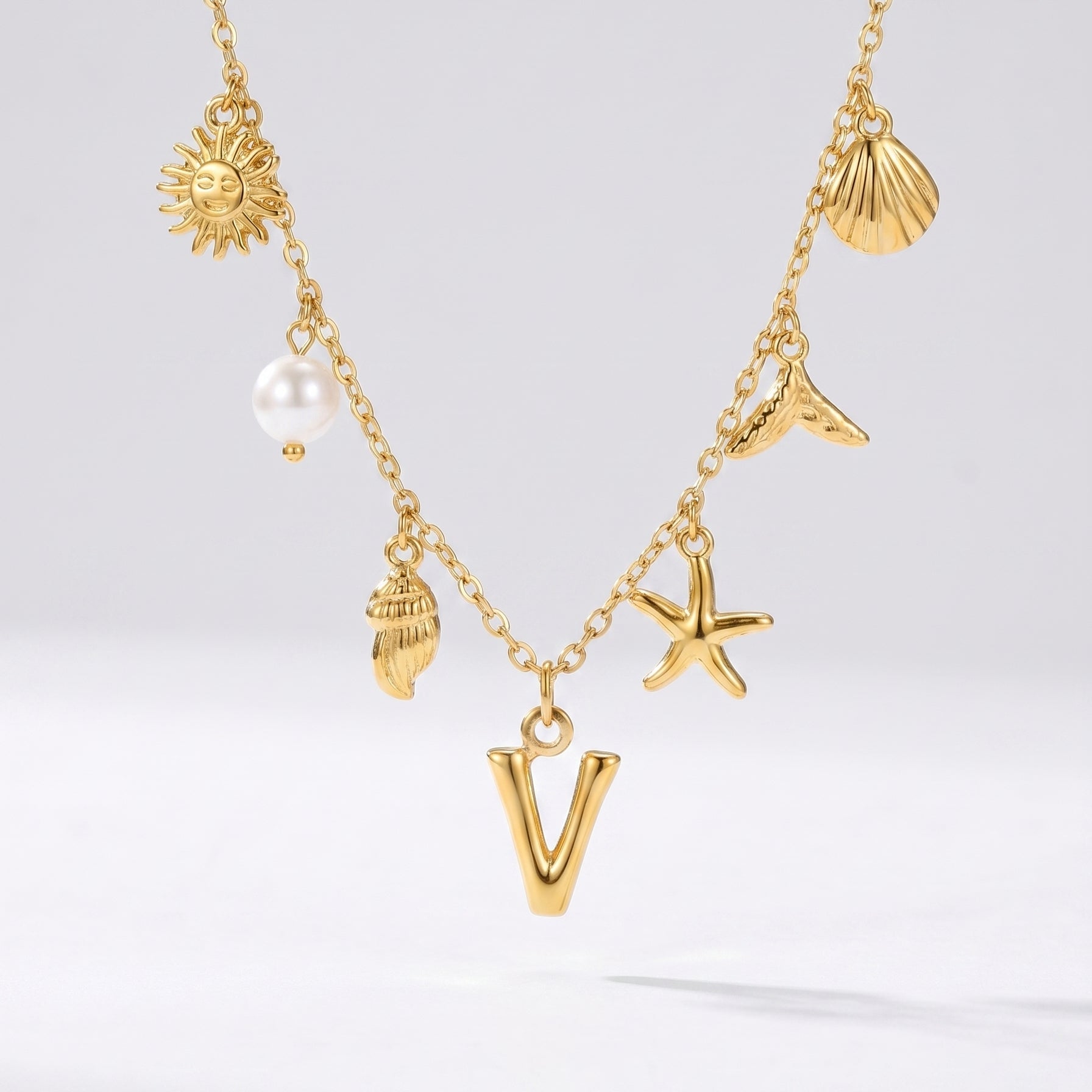 Colar Letra Oceano Dourado
