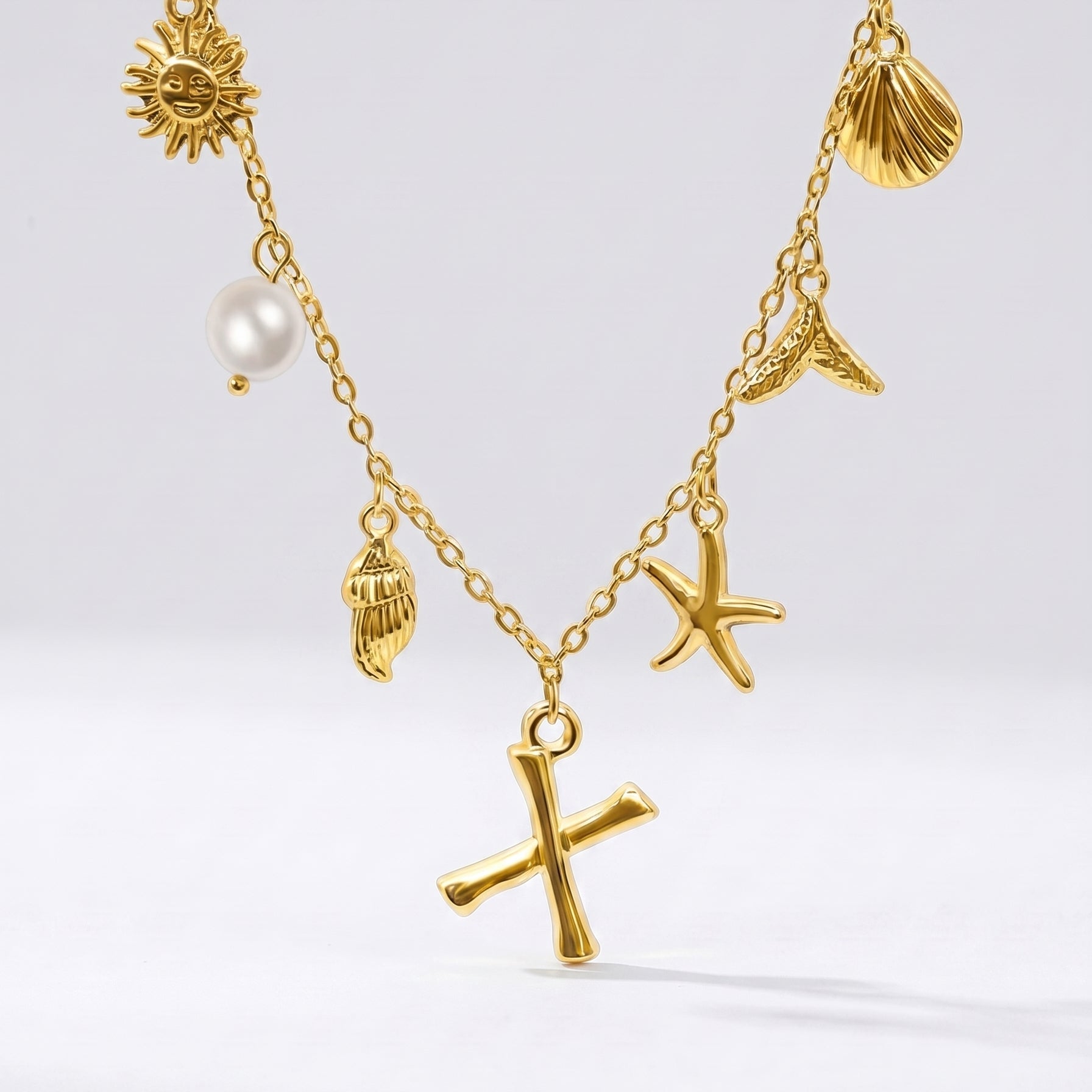 Colar Letra Oceano Dourado
