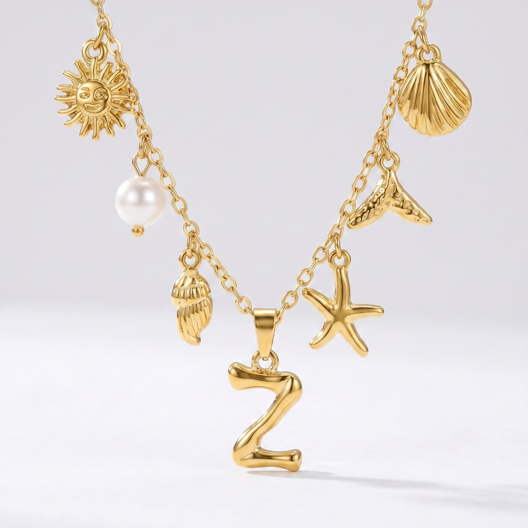 Colar Letra Oceano Dourado