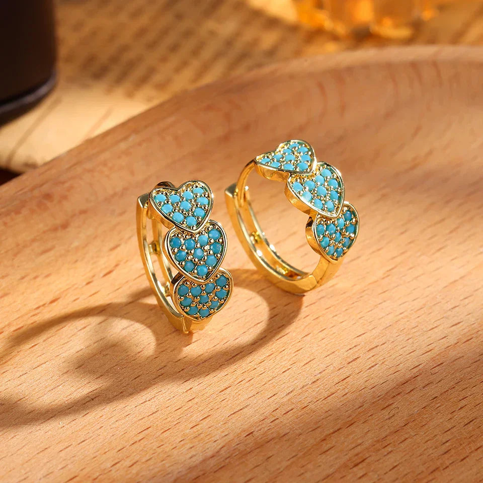 Brincos de argola com flores em azul turquesa