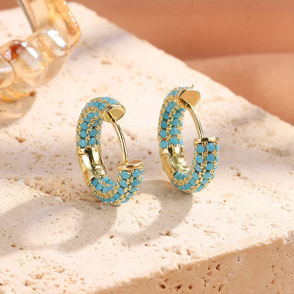 Brincos de argola com flores em azul turquesa