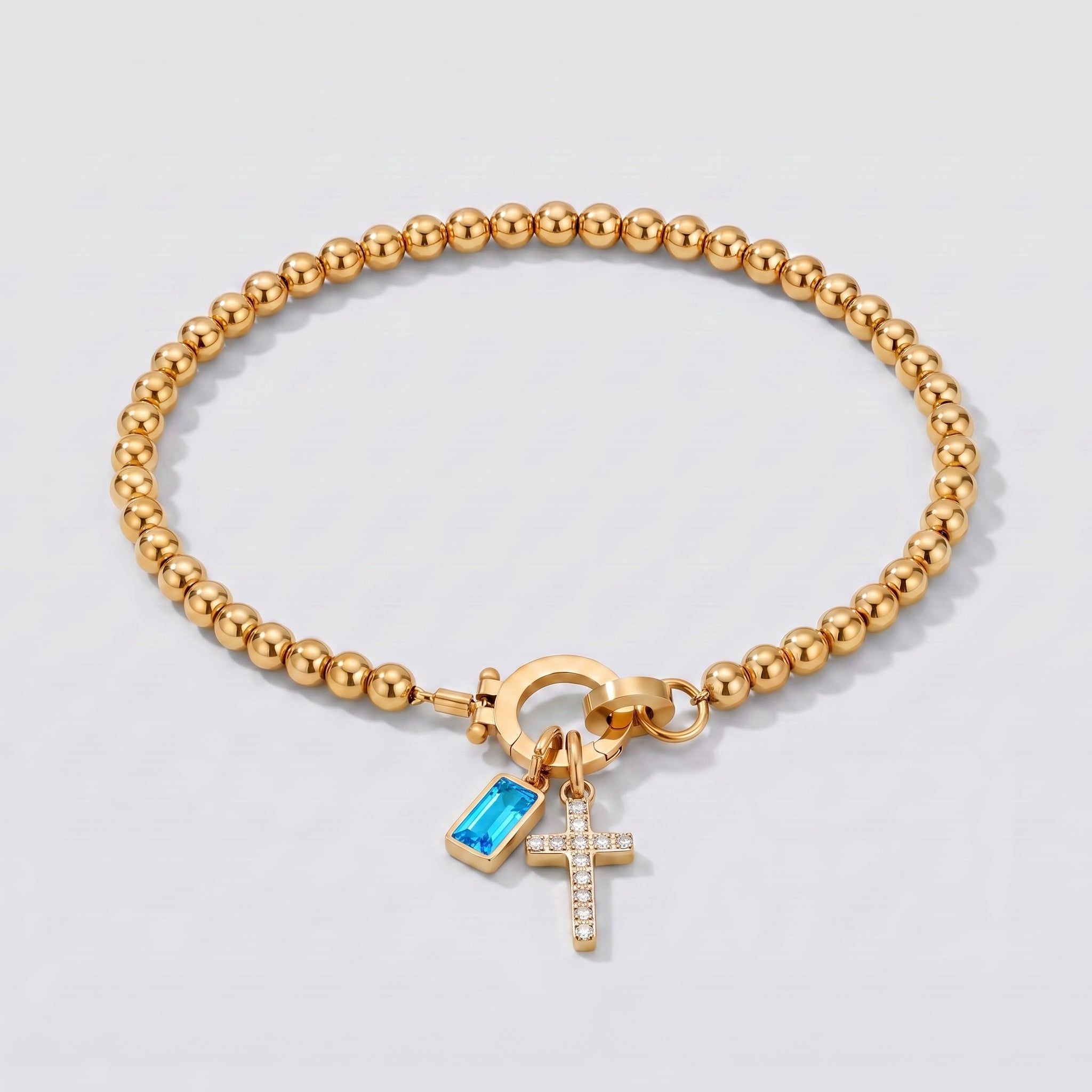 Pulseira de Contas com Cruz e Pedra de Nascimento