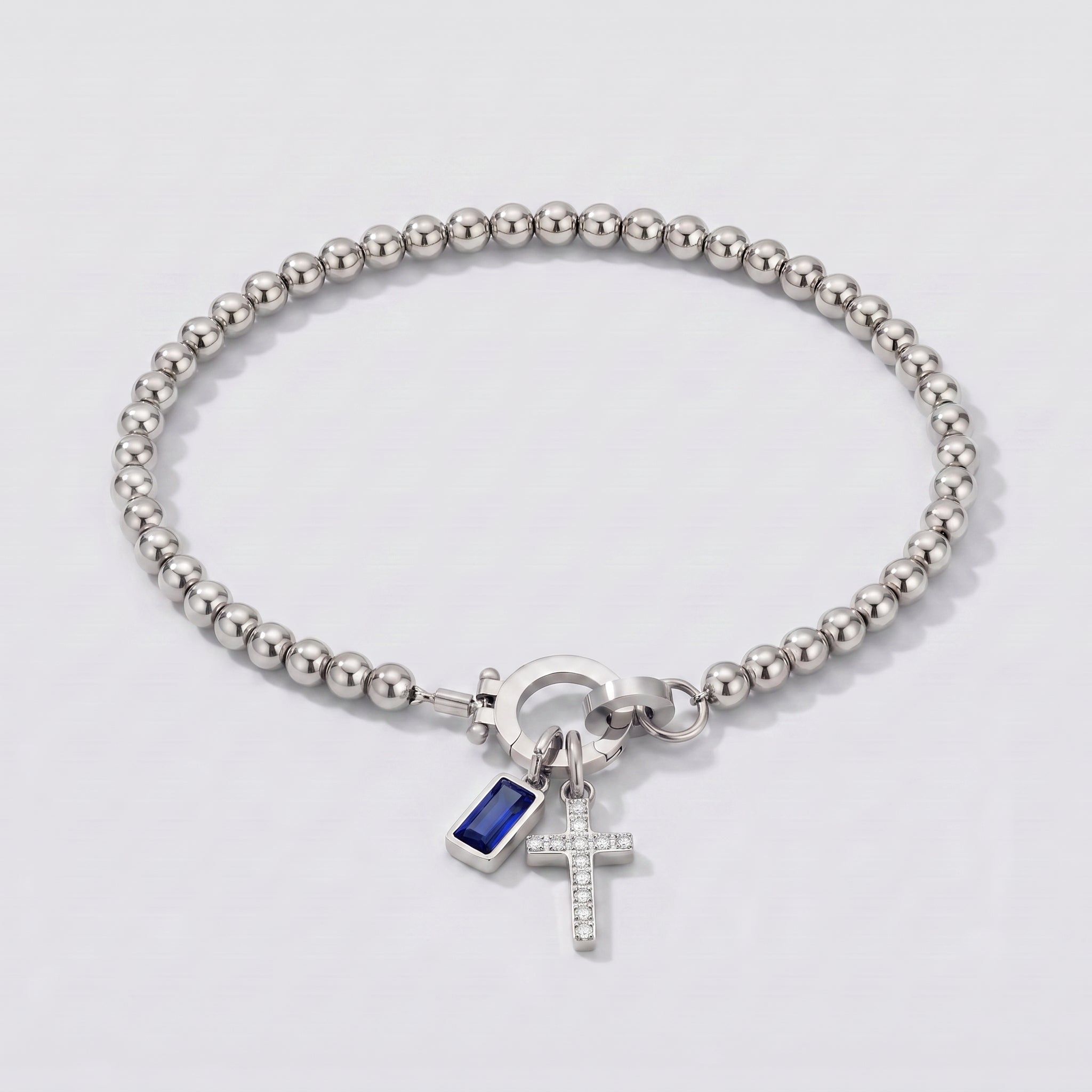 Pulseira de Contas com Cruz e Pedra de Nascimento